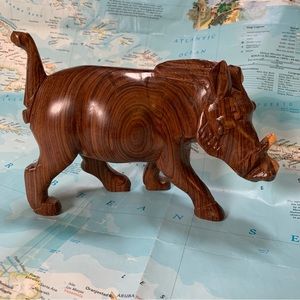 Carved wooden boar.